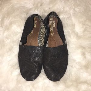 sparkly black toms